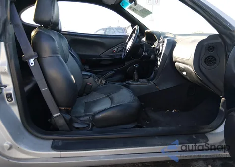 2001 Hyundai Tiburon Base Pkg 1 2 z USA, uszkodzony, nr VIN KMHJG35F11U244275